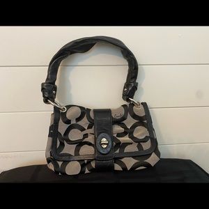 Coach shoulder bag with traditional C pattern